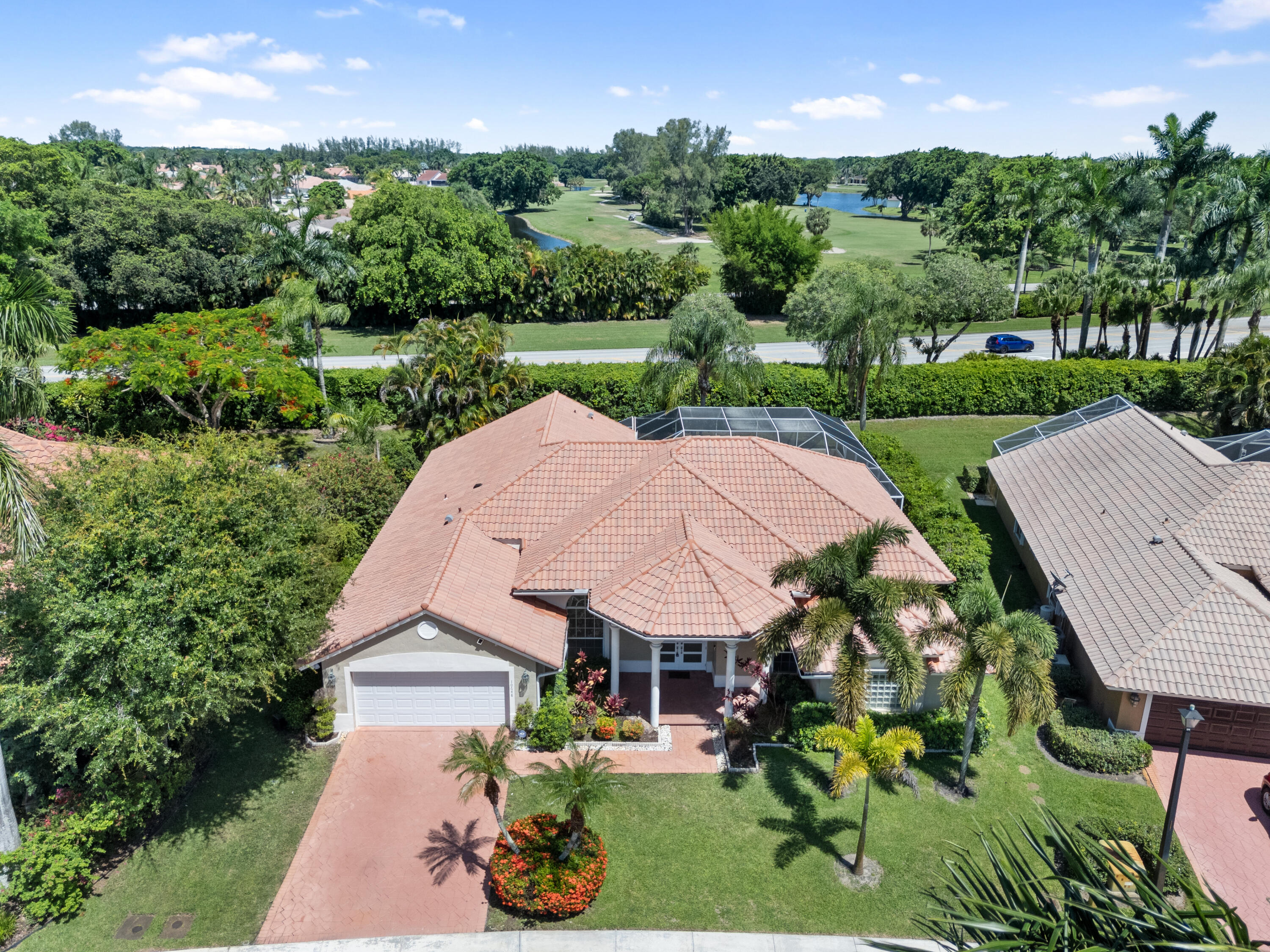 10648 Maple Chase Drive Boca Raton, FL 33498 - Photo 39 of 52 an aerial view of a house with outdoor space and street view