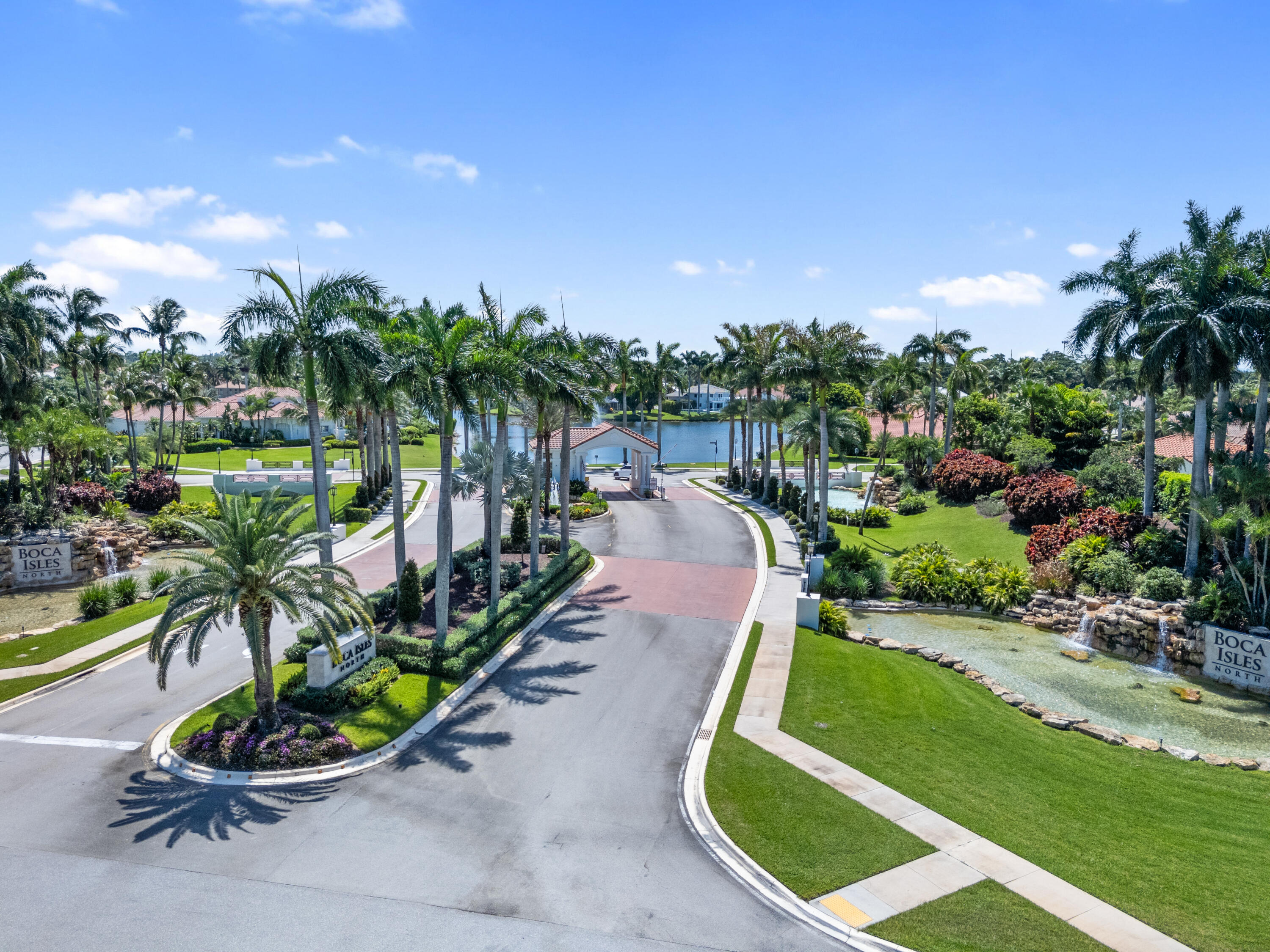 10648 Maple Chase Drive Boca Raton, FL 33498 - Photo 43 of 52 a view of a swimming pool with a garden and plants