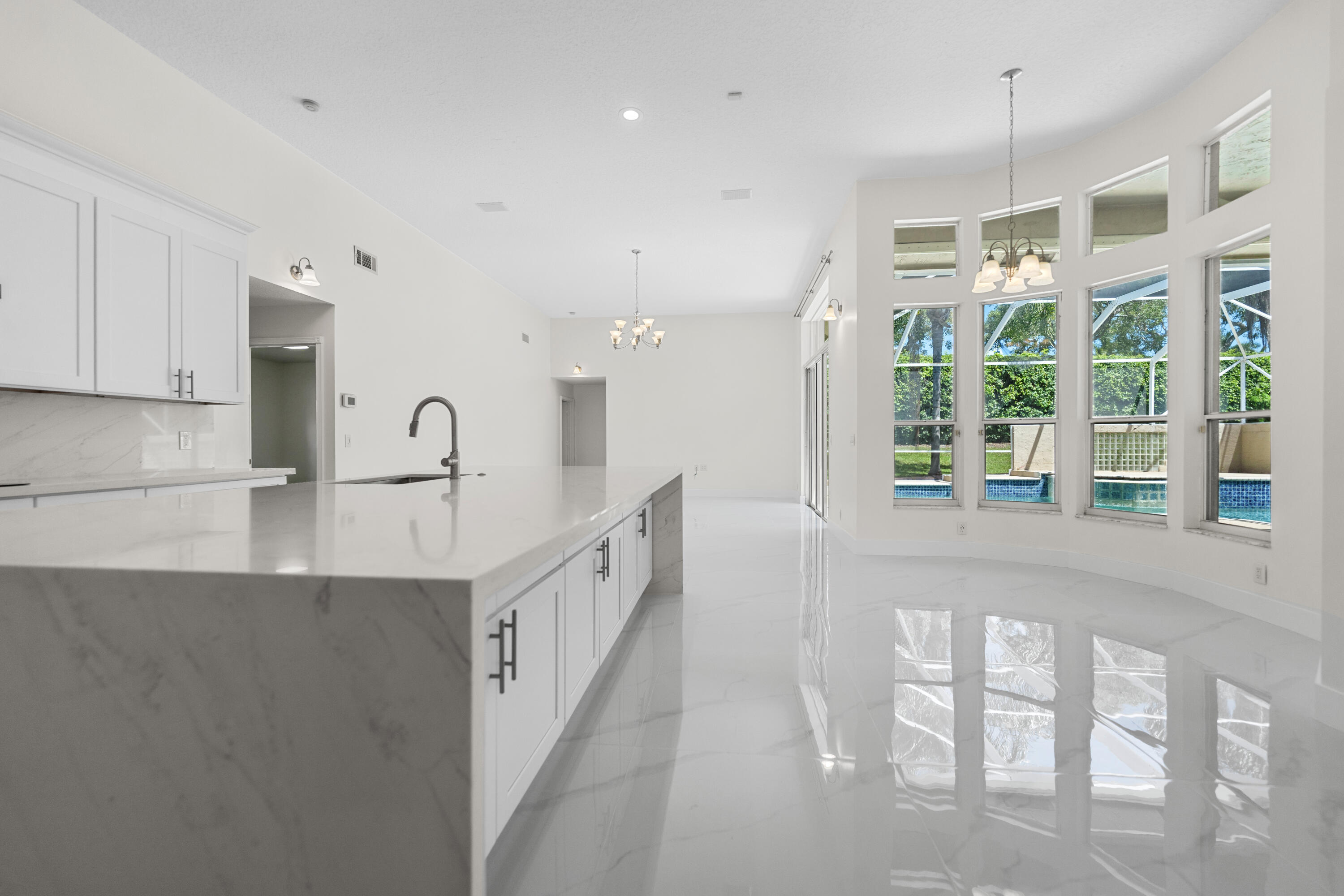 10648 Maple Chase Drive Boca Raton, FL 33498 - Photo 7 of 52 a view of a kitchen with a sink and windows
