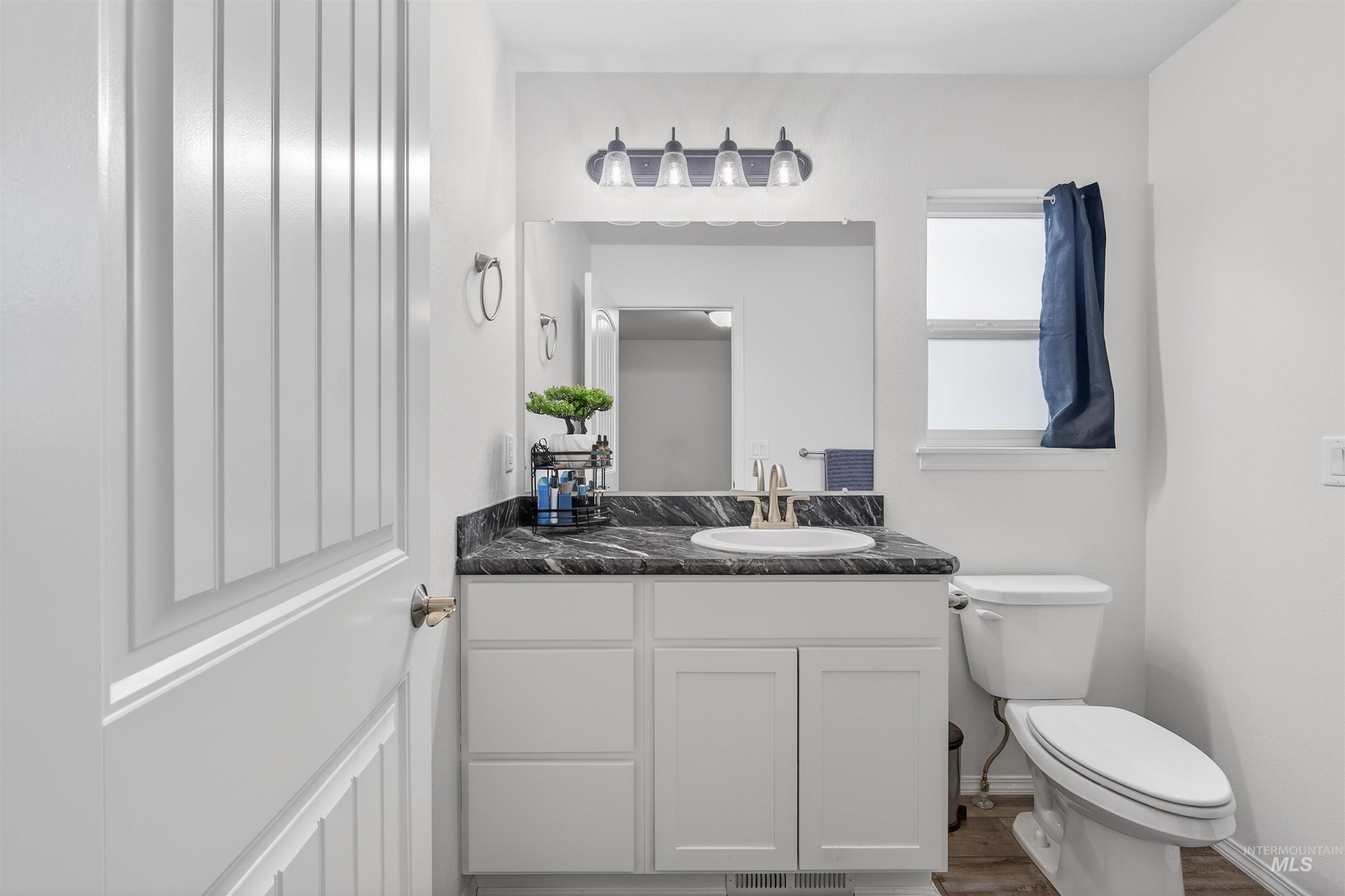 1432 Horizon Court Lewiston, ID 83501 - Photo 22 of 26 Bathroom featuring vanity and toilet