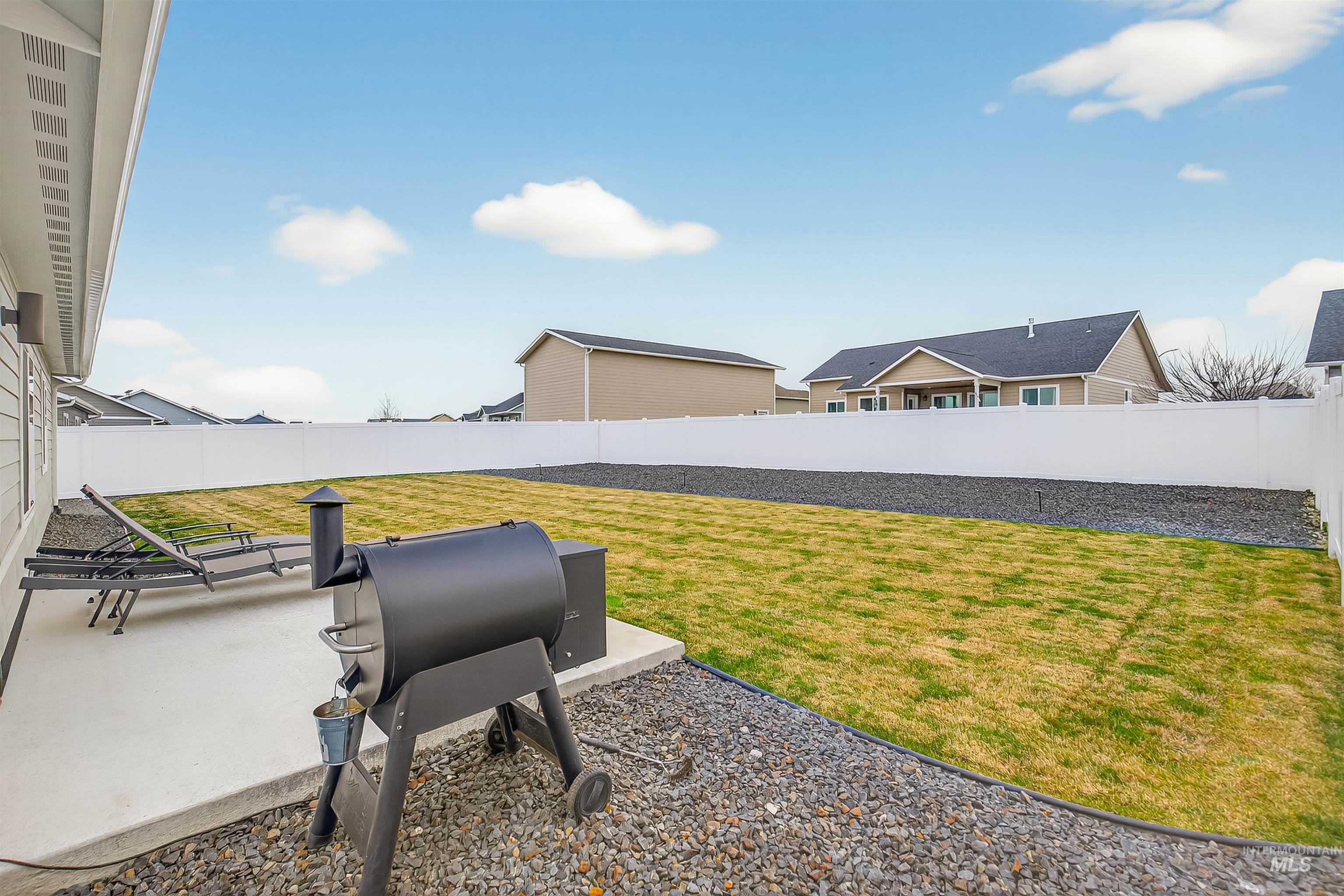 1432 Horizon Court Lewiston, ID 83501 - Photo 7 of 26 Fenced backyard featuring a patio