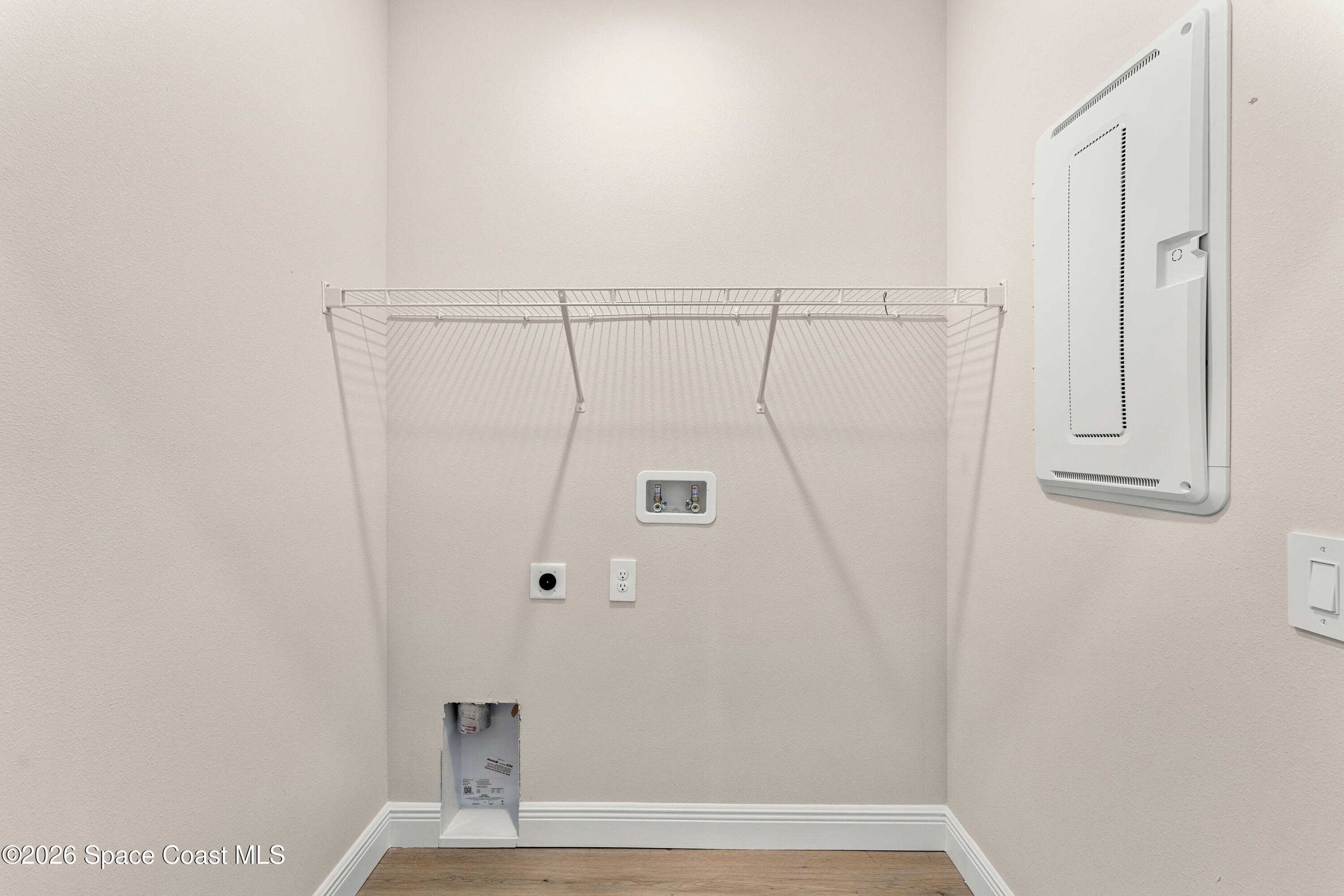 455 Mimosa Street Southwest Palm Bay, FL 32908 - Photo 18 of 43 a view of entryway with wooden floor