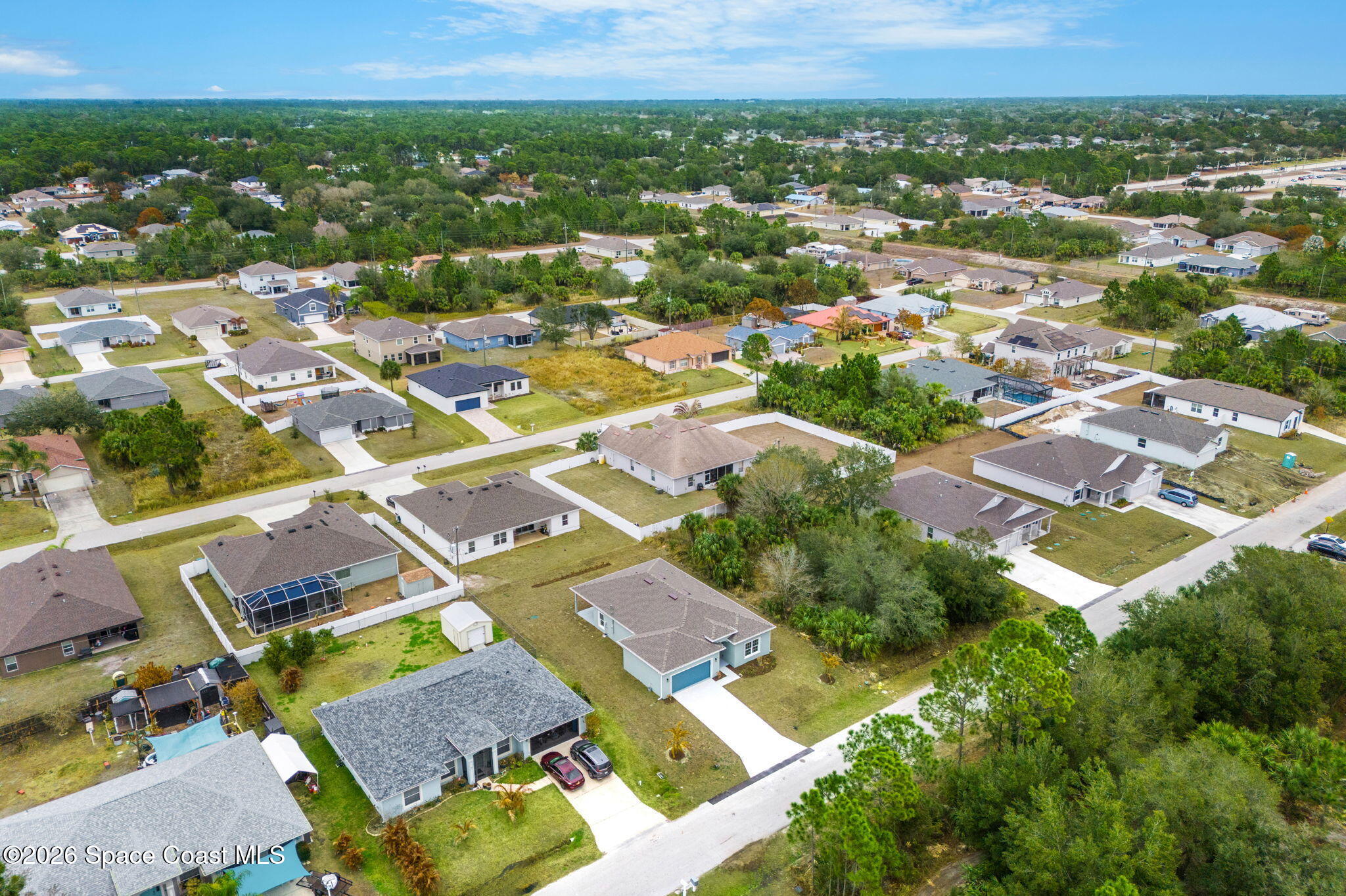 455 Mimosa Street Southwest Palm Bay, FL 32908 - Photo 25 of 43 an aerial view of residential houses with outdoor space