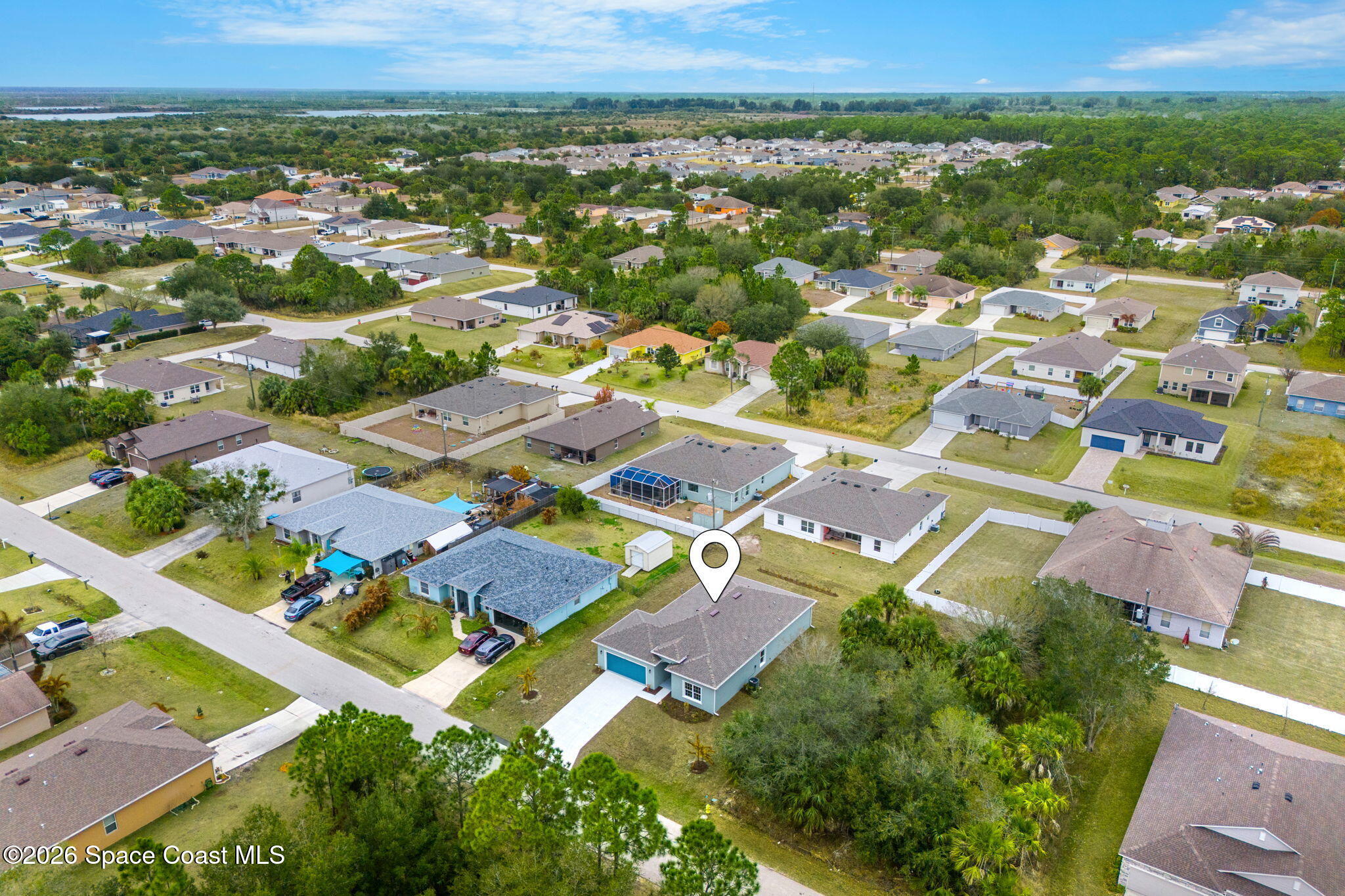 455 Mimosa Street Southwest Palm Bay, FL 32908 - Photo 29 of 43 an aerial view of residential houses with outdoor space
