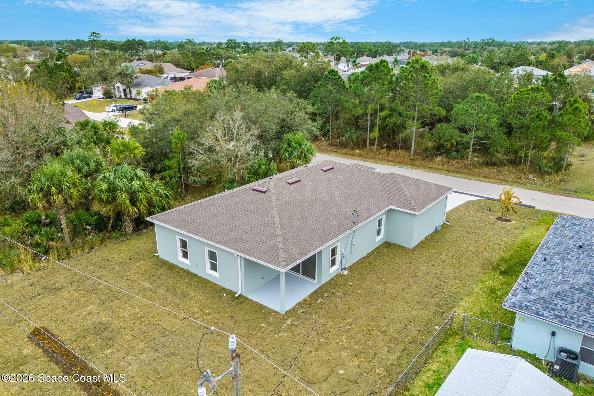 455 Mimosa Street Southwest Palm Bay, FL 32908 - Photo 36 of 43 a view of a backyard with plants and mountain view