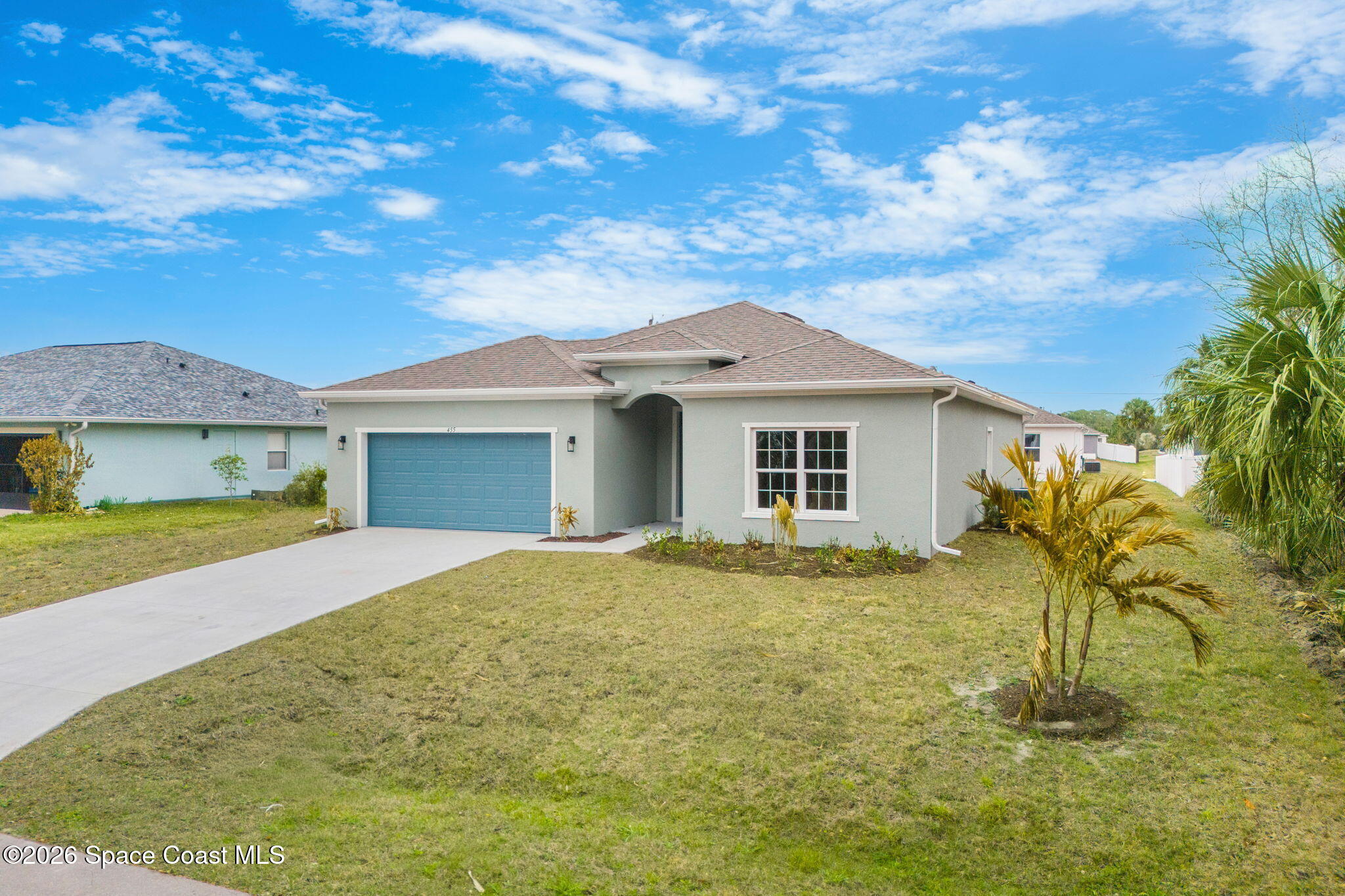 455 Mimosa Street Southwest Palm Bay, FL 32908 - Photo 40 of 43 a front view of a house with a garden