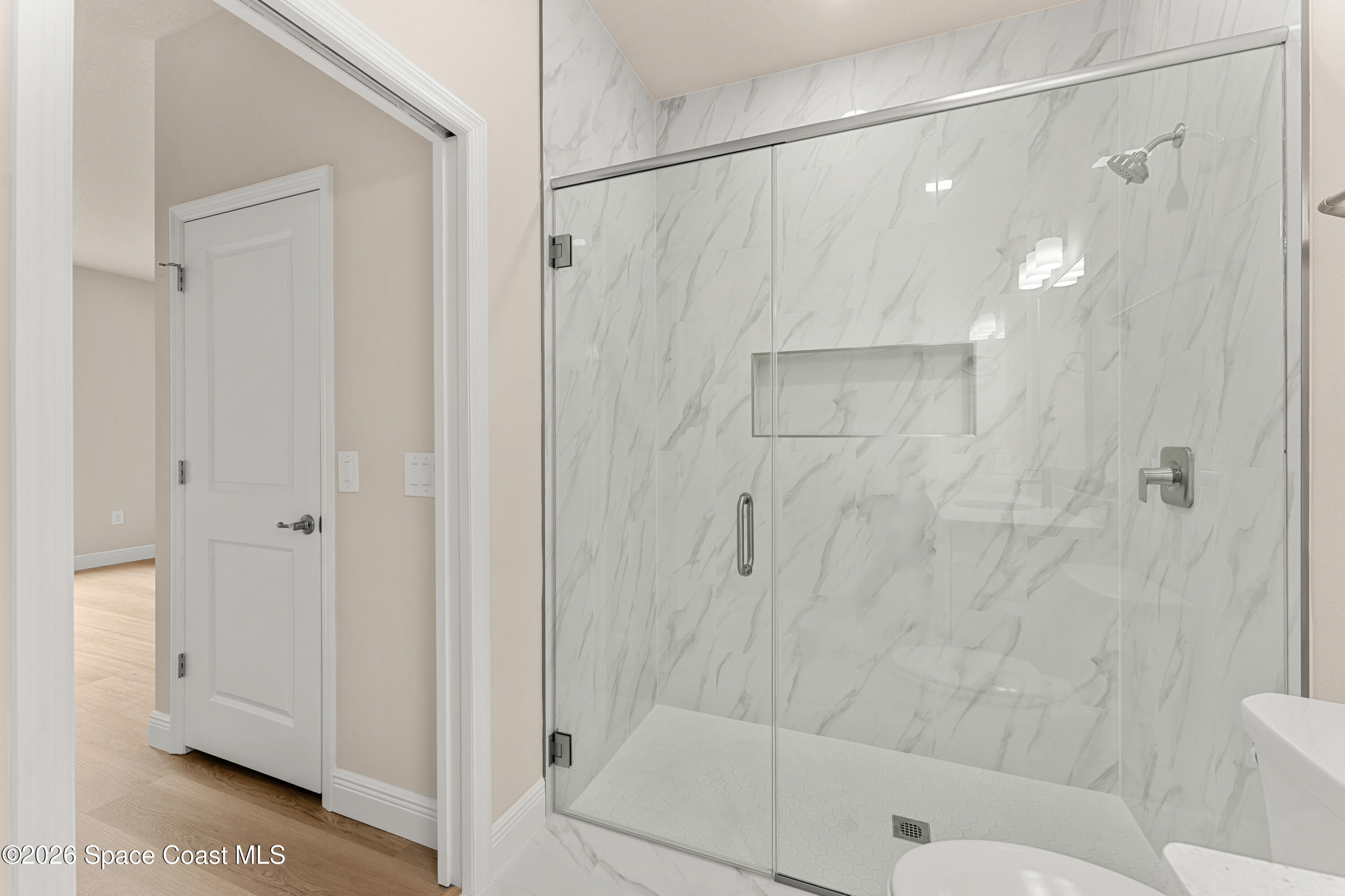 455 Mimosa Street Southwest Palm Bay, FL 32908 - Photo 7 of 43 a bathroom with a shower