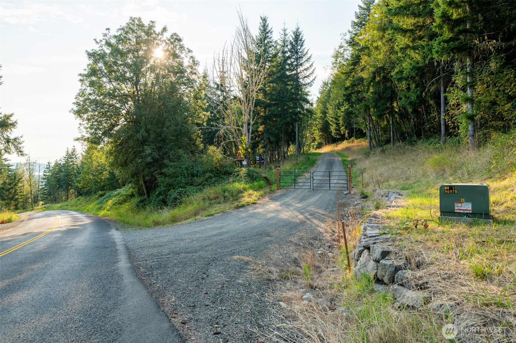 189 Kjesbu Road Silver Creek, WA 98585 - Photo 3 of 17 a view of a lake with a yard