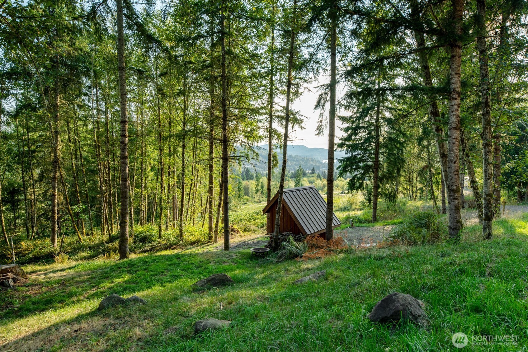 189 Kjesbu Road Silver Creek, WA 98585 - Photo 7 of 17 a view of a park with a slide