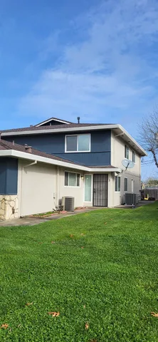 a house view with a garden space