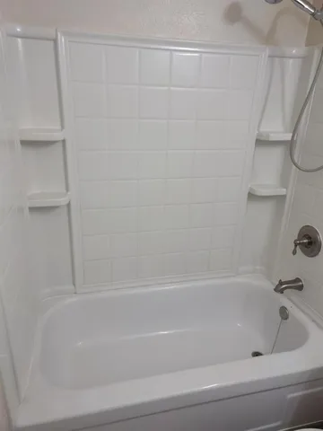 a bathroom with a bathtub