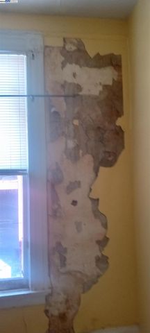 a bathroom with a toilet bathtub and shower