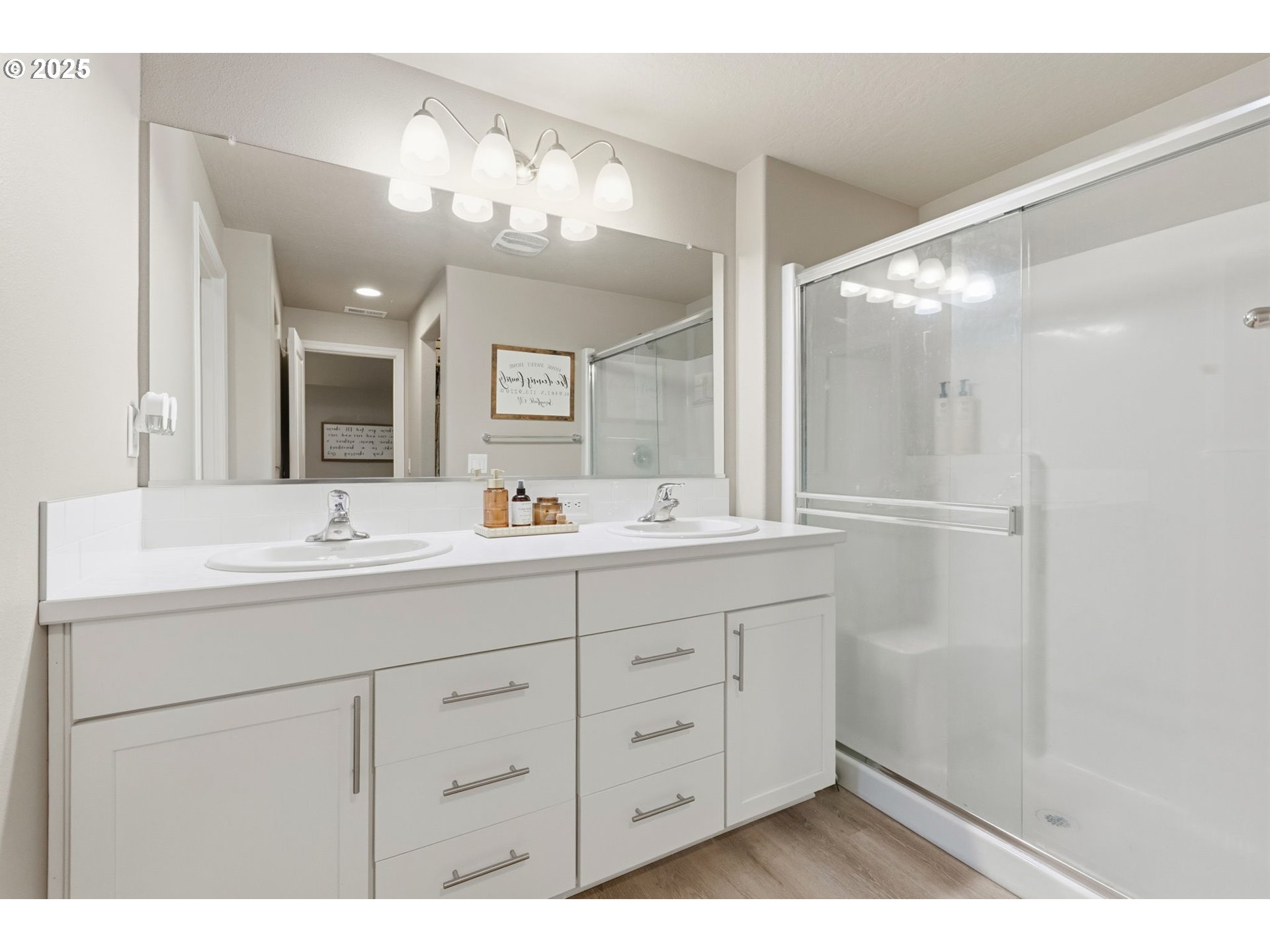 4970 Squirrel Street Springfield, OR 97478 - Photo 26 of 43 a bathroom with a double vanity sink and a mirror