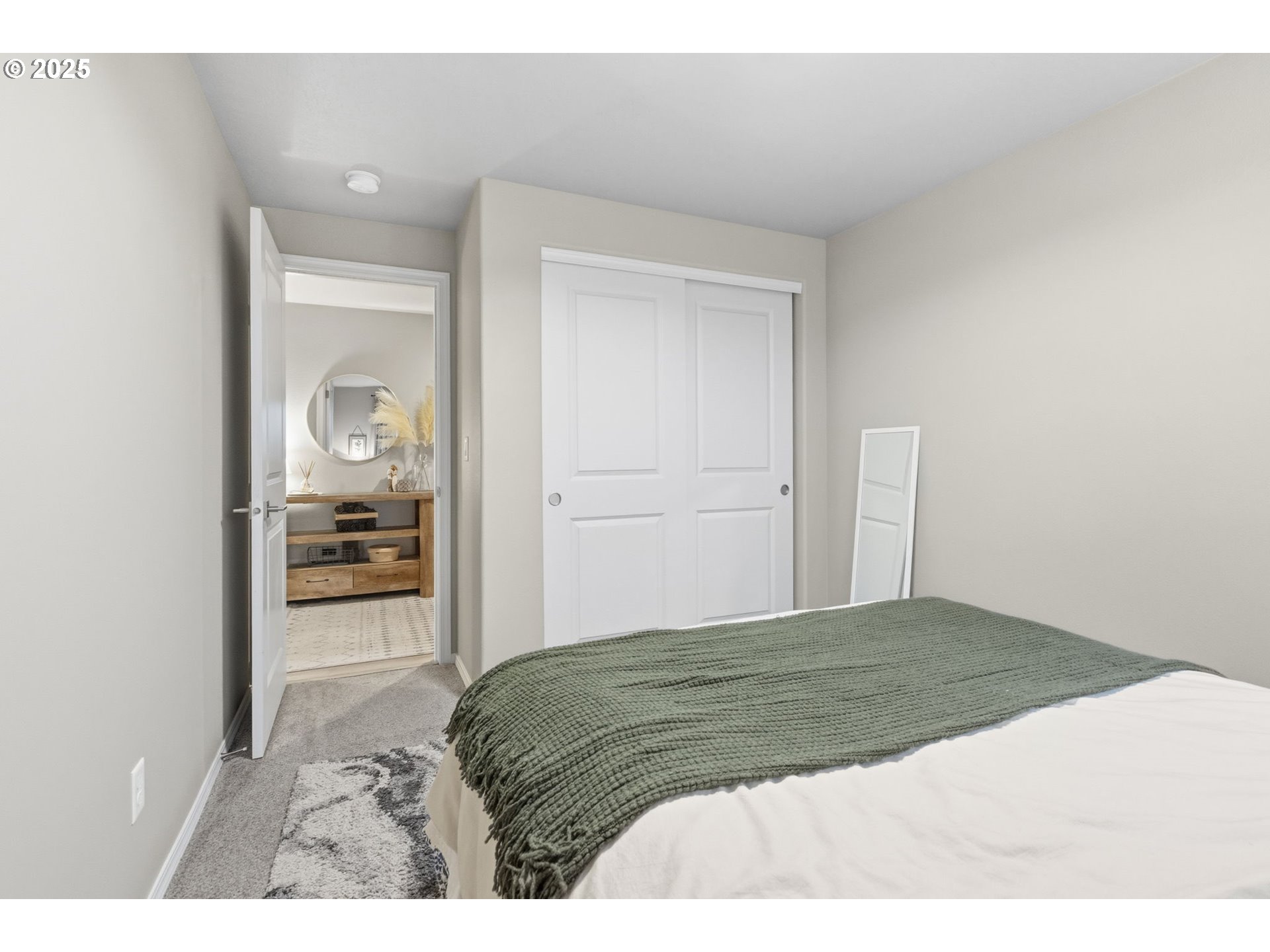 4970 Squirrel Street Springfield, OR 97478 - Photo 34 of 43 a bedroom with a bed and view of living room