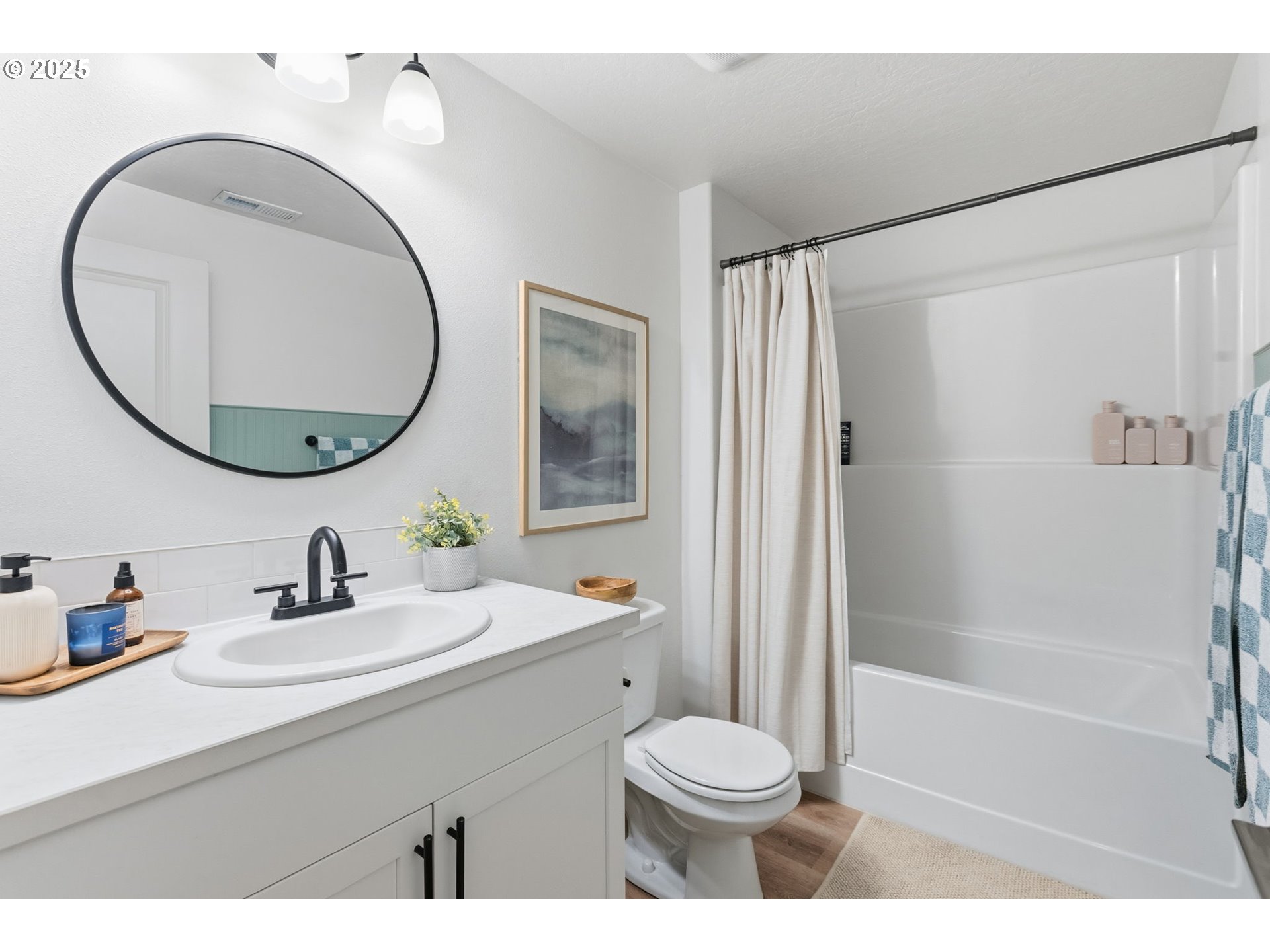 4970 Squirrel Street Springfield, OR 97478 - Photo 35 of 43 a bathroom with a sink a toilet and a mirror