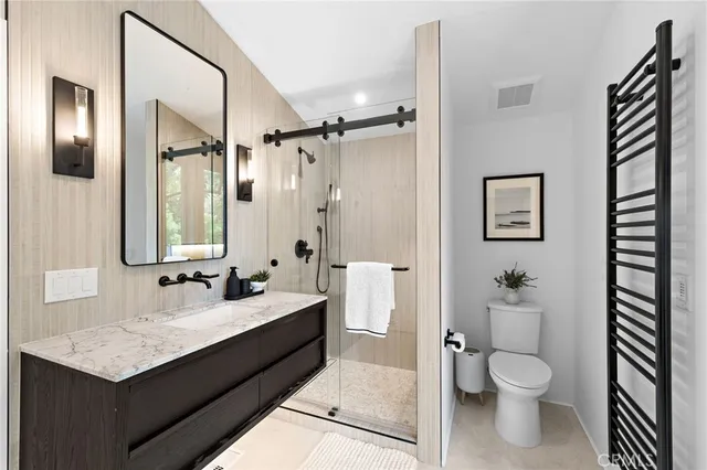 a view of balcony with wooden floor and outdoor seating
