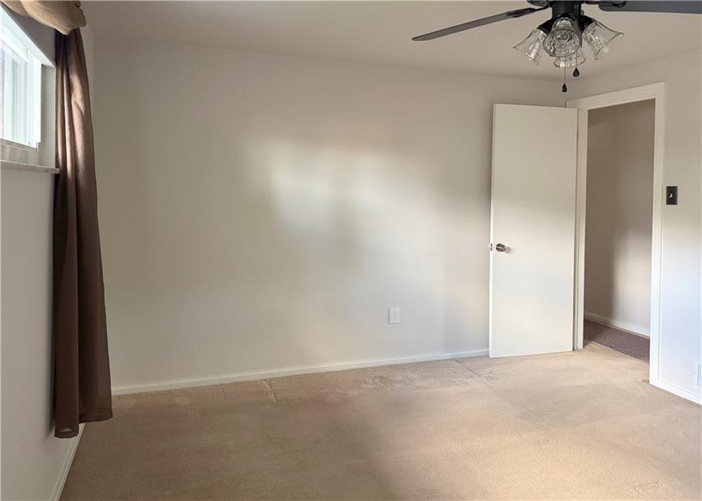 1533 Indiana Avenue Monaca, PA 15061 - Photo 13 of 27 an empty room with a empty space and windows