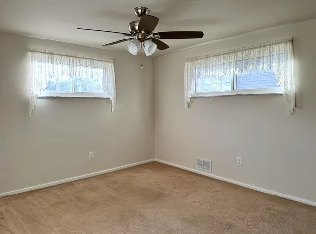 a view of a livingroom with a window