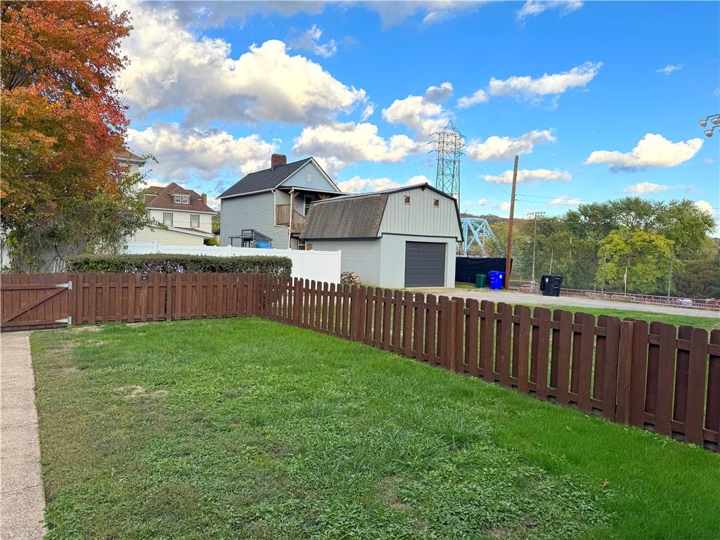 1533 Indiana Avenue Monaca, PA 15061 - Photo 24 of 27 a view of a garden with wooden fence