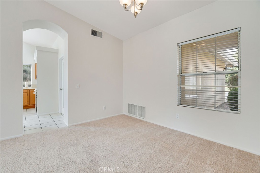 2787 Banyan Tree Lane Hemet, CA 92545 - Photo 11 of 36 a view of an empty room with a window