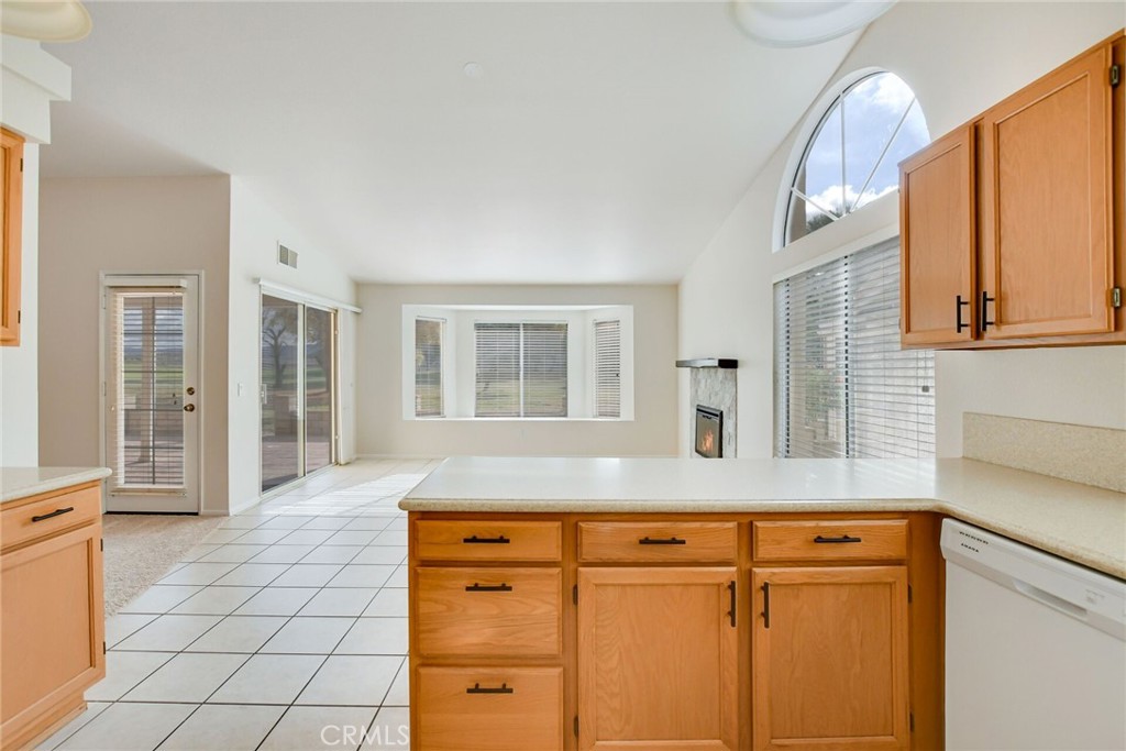 2787 Banyan Tree Lane Hemet, CA 92545 - Photo 19 of 36 a kitchen with cabinets and window