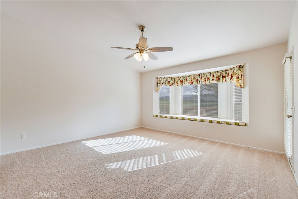 2787 Banyan Tree Lane Hemet, CA 92545 - Photo 22 of 36 a view of an empty room with a window