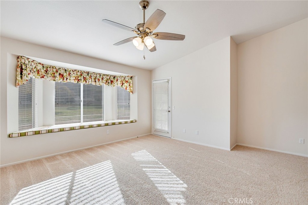 2787 Banyan Tree Lane Hemet, CA 92545 - Photo 23 of 36 a view of an empty room with a window