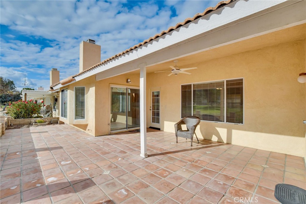 2787 Banyan Tree Lane Hemet, CA 92545 - Photo 32 of 36 a view of a building with chair and tables