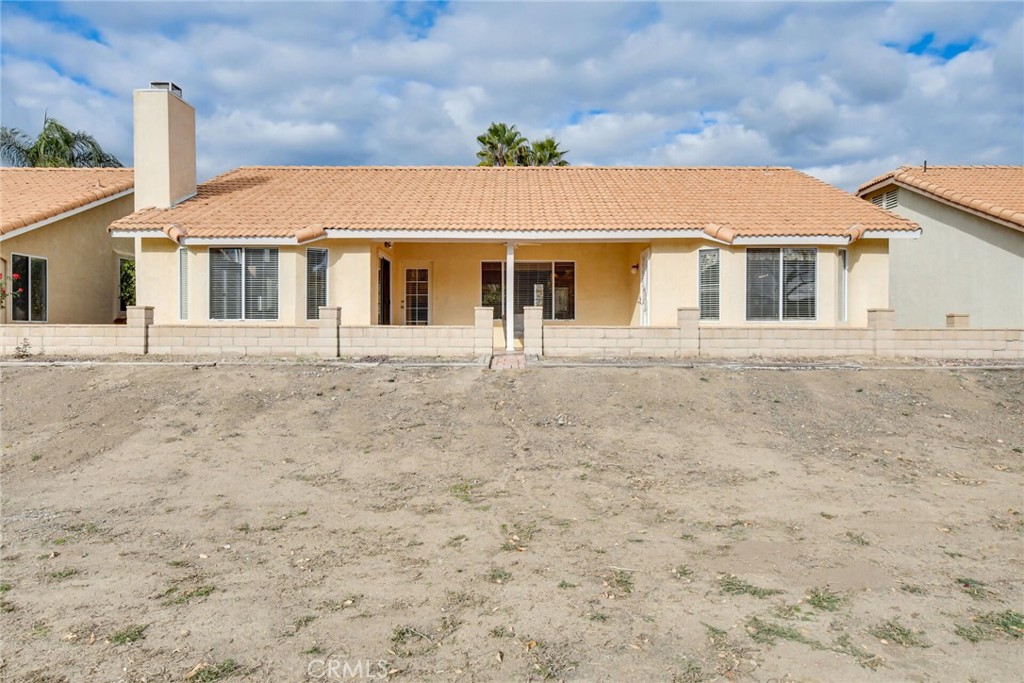2787 Banyan Tree Lane Hemet, CA 92545 - Photo 36 of 36 a front view of a house with a garden