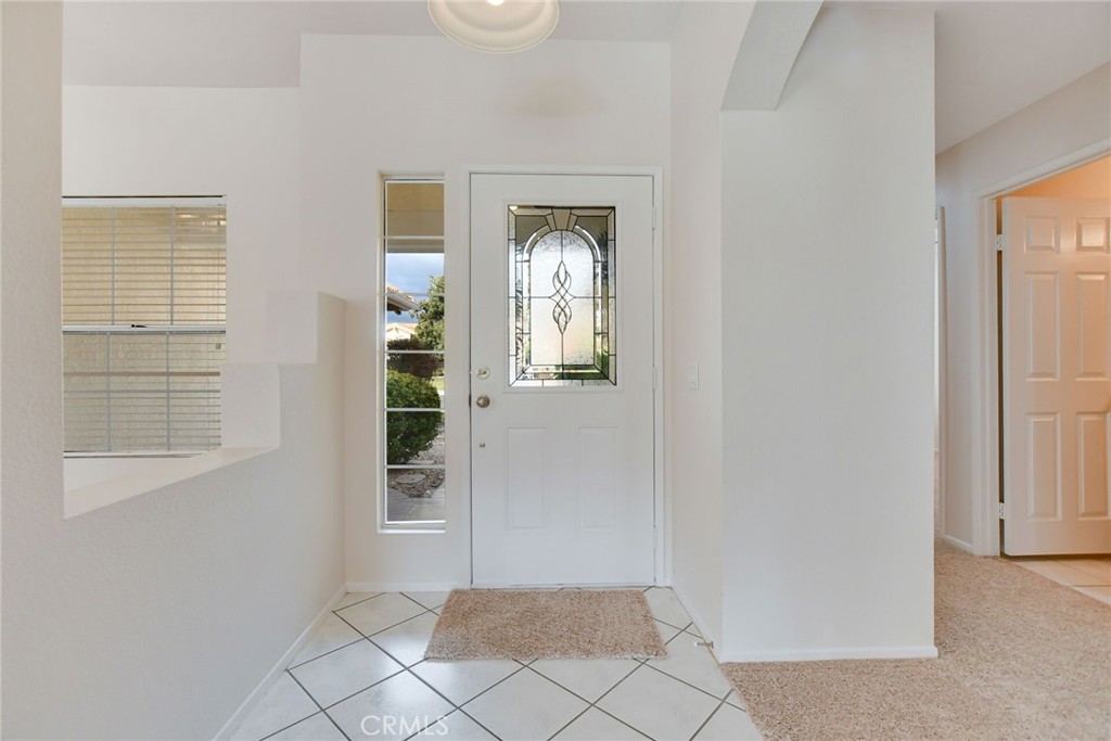 2787 Banyan Tree Lane Hemet, CA 92545 - Photo 5 of 36 a view of an entryway with a window