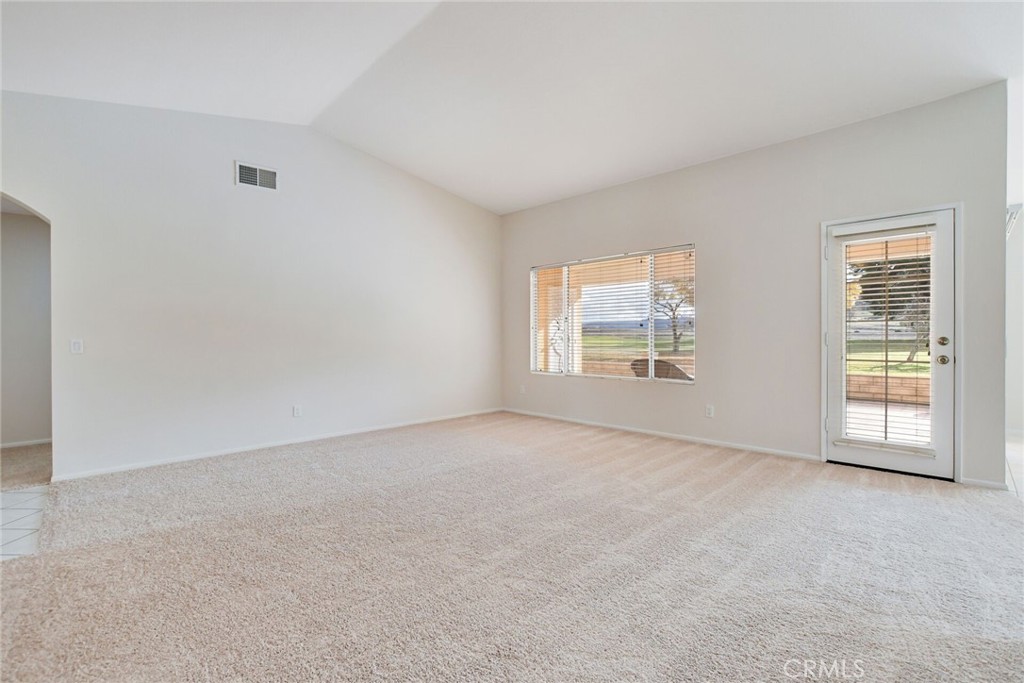 2787 Banyan Tree Lane Hemet, CA 92545 - Photo 9 of 36 an empty room with windows