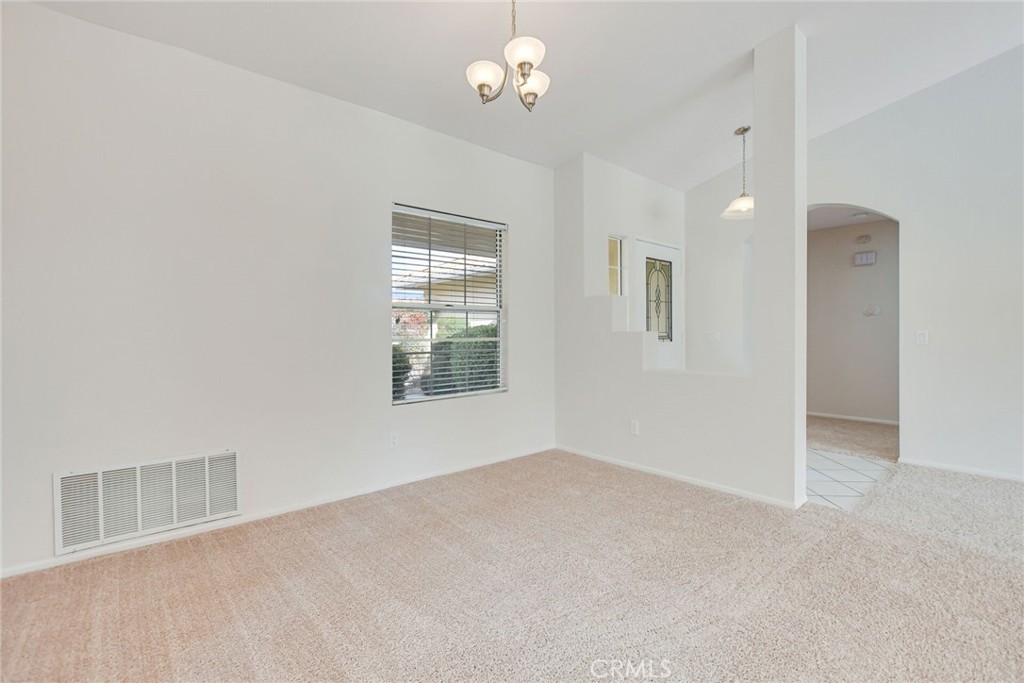 2787 Banyan Tree Lane Hemet, CA 92545 - Photo 10 of 36 a view of an empty room with a window