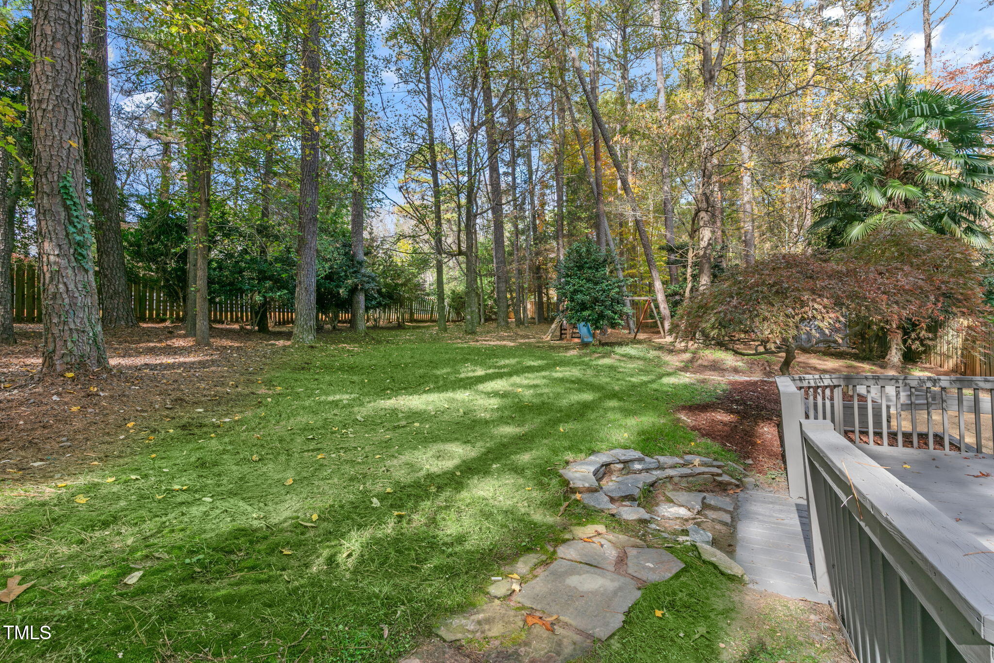 6205 Trevor Court Raleigh, NC 27613 - Photo 42 of 42 Grass and wooded