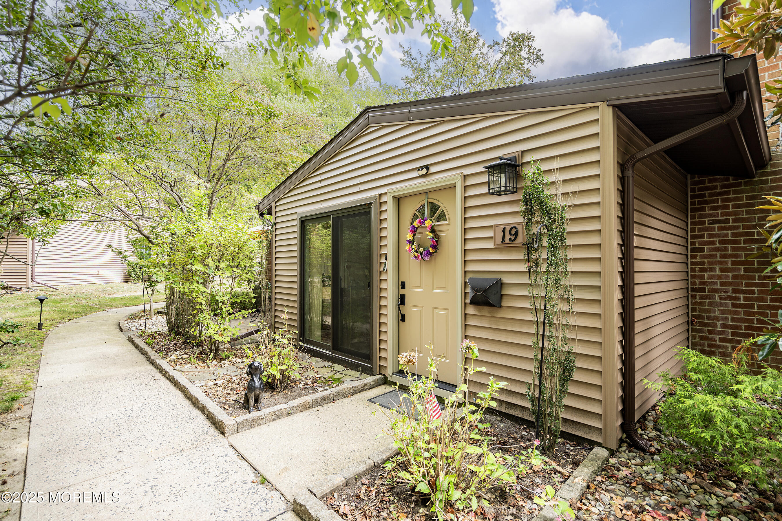 19 Manchester Court Red Bank, NJ 07701 - Photo 2 of 19 a front view of a house with garden