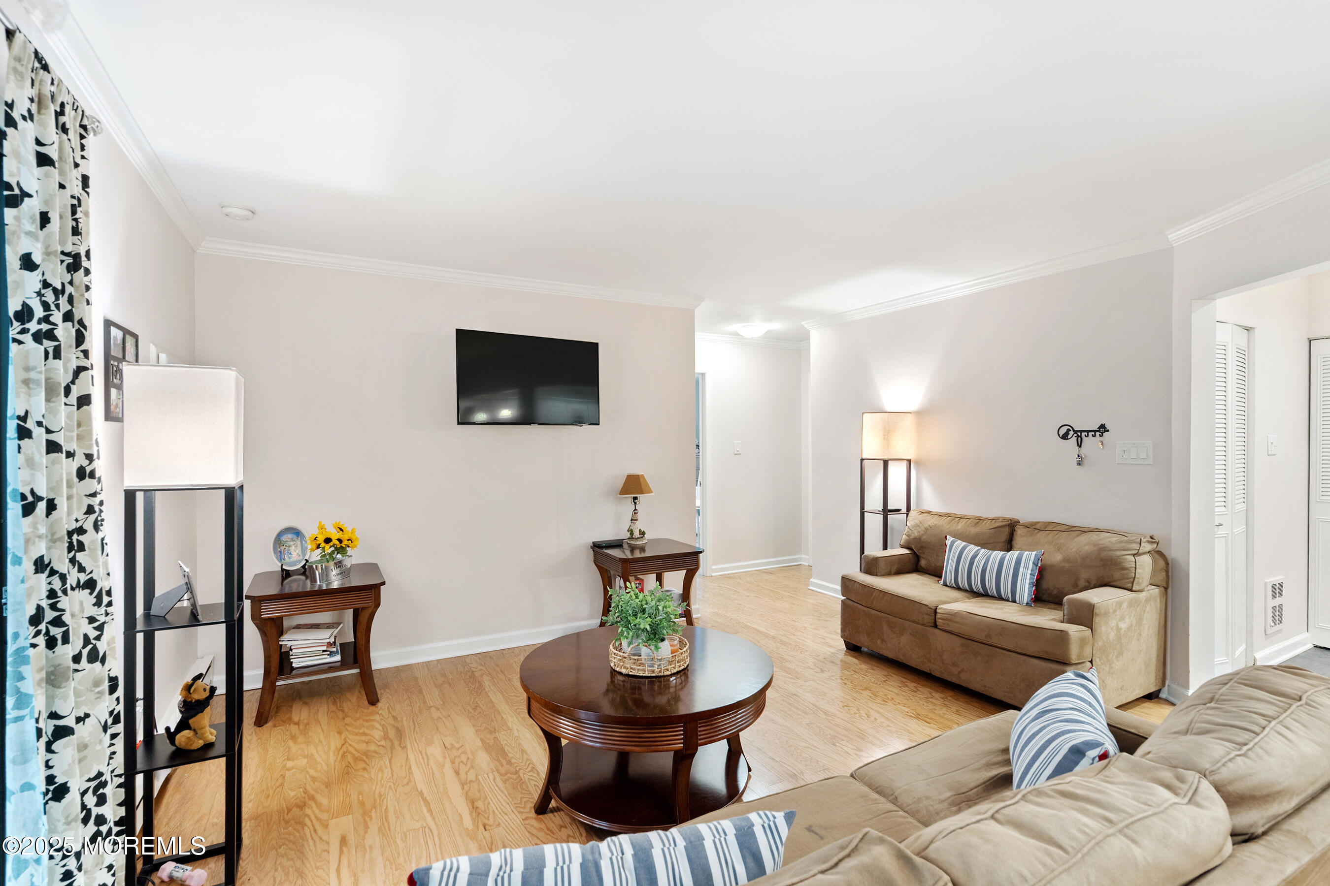 19 Manchester Court Red Bank, NJ 07701 - Photo 5 of 19 a living room with furniture and a couch