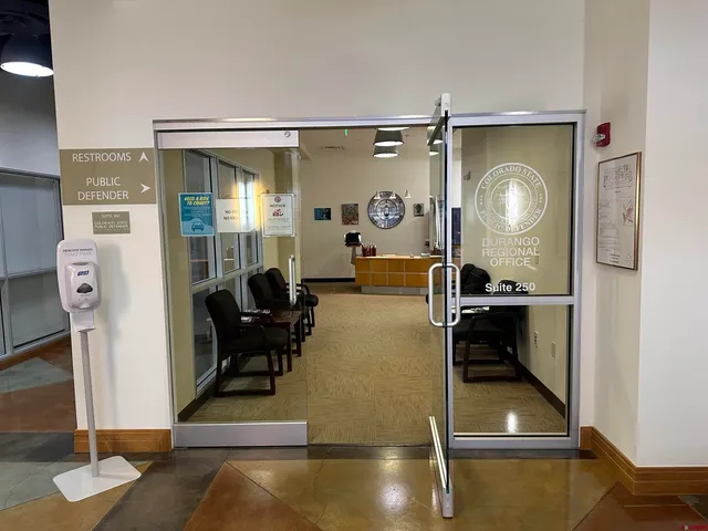 a room with a table and a clock
