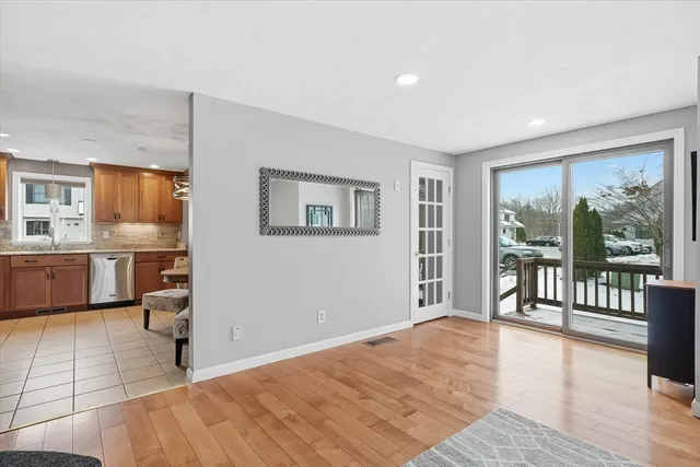 a view of a kitchen with a sink and a window