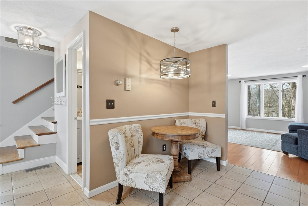 18 Carriage Court, Unit 18 Merrimac, MA 01860 - Photo 14 of 38 a living room with furniture and a large window