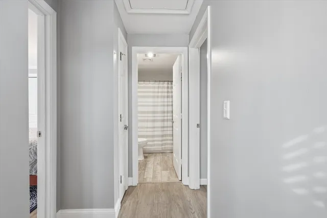 a view of a bedroom from a hallway