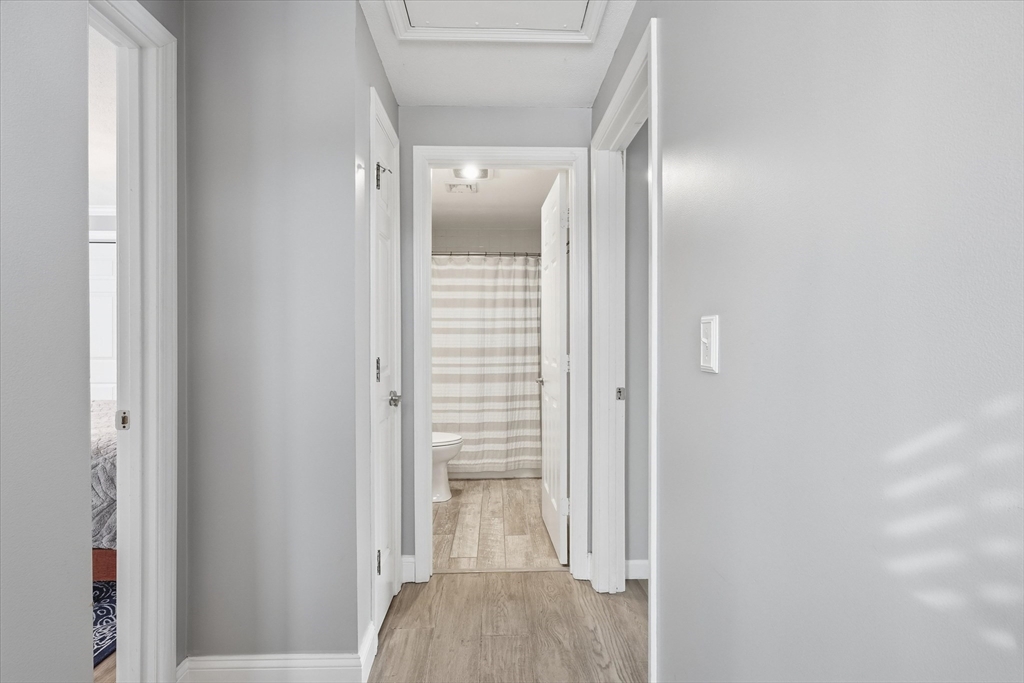 18 Carriage Court, Unit 18 Merrimac, MA 01860 - Photo 17 of 38 a view of a bedroom from a hallway