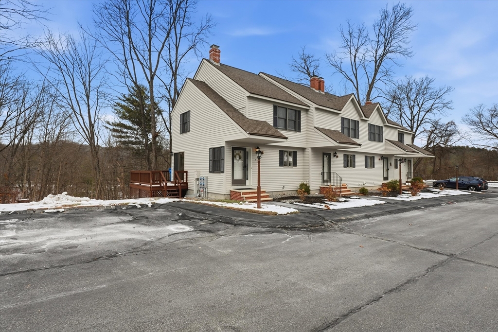 18 Carriage Court, Unit 18 Merrimac, MA 01860 - Photo 31 of 38 a view of the house with a street