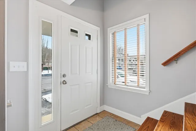 a view of room with window and bathroom