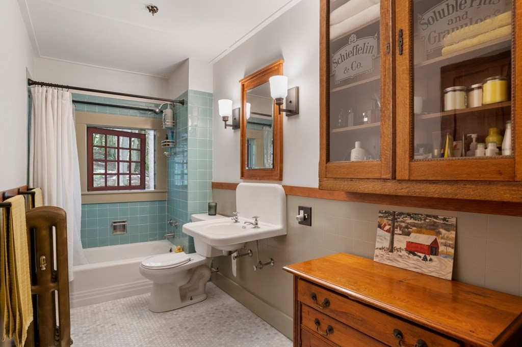201 Winchester Road Northfield, MA 01360 - Photo 27 of 30 a bathroom with a sink toilet and mirror
