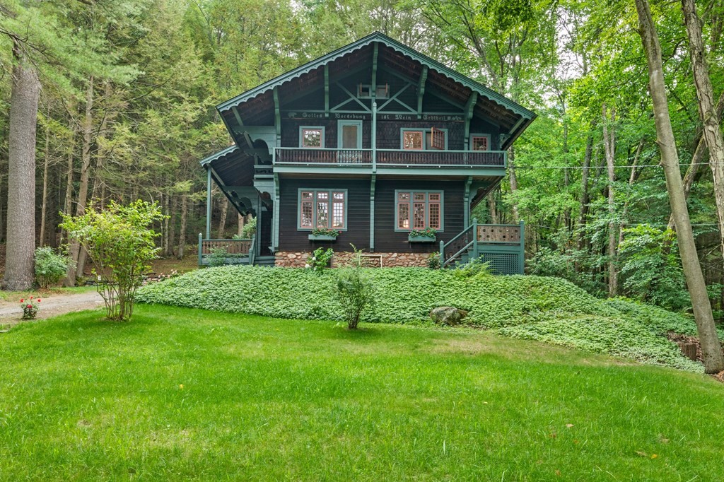 201 Winchester Road Northfield, MA 01360 - Photo 3 of 30 a front view of a house with a yard and green space