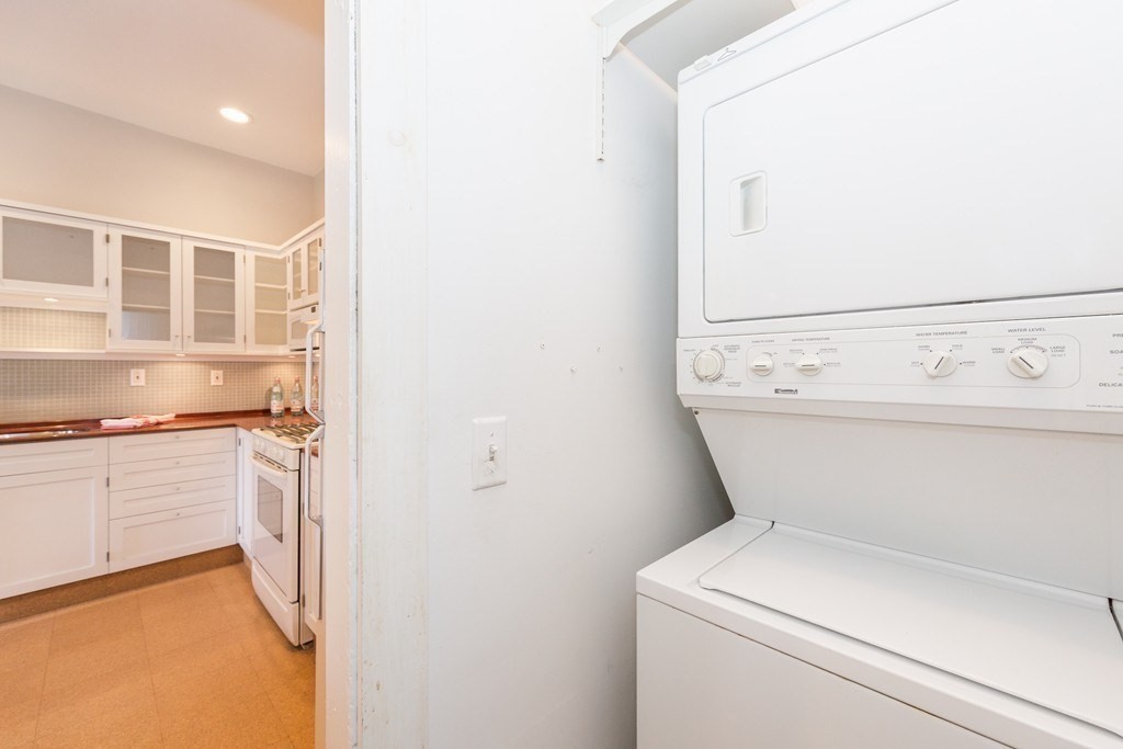 12 Willow Court, Unit A Arlington, MA 02476 - Photo 12 of 16 a utility room with dryer and washer