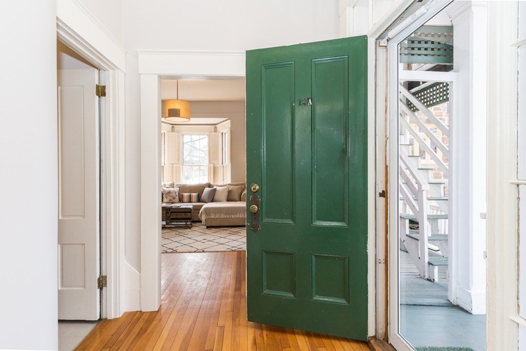 12 Willow Court, Unit A Arlington, MA 02476 - Photo 13 of 16 a living room with furniture and a large window