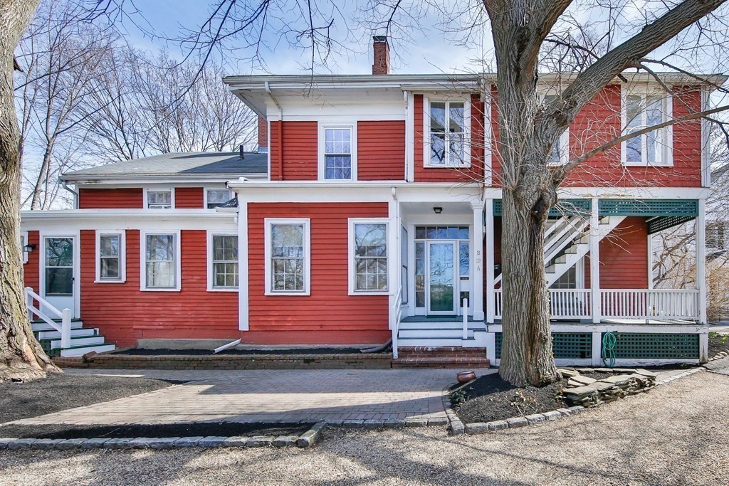 12 Willow Court, Unit A Arlington, MA 02476 - Photo 15 of 16 a front view of residential houses with street
