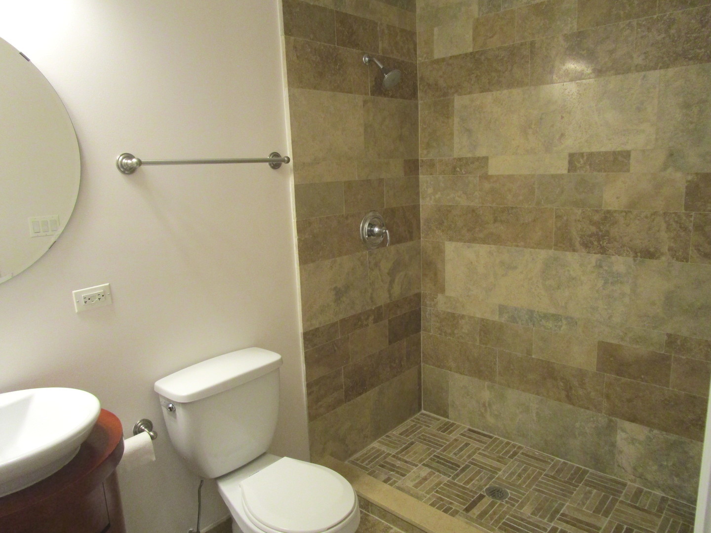 2545 South Dearborn Street, Unit 608 Chicago, IL 60616 - Photo 18 of 28 a white toilet sitting next to a bath tub