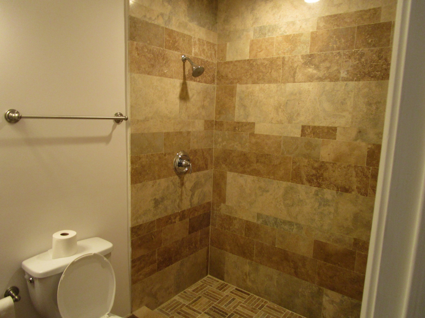 2545 South Dearborn Street, Unit 608 Chicago, IL 60616 - Photo 19 of 28 a bathroom with a toilet and shower