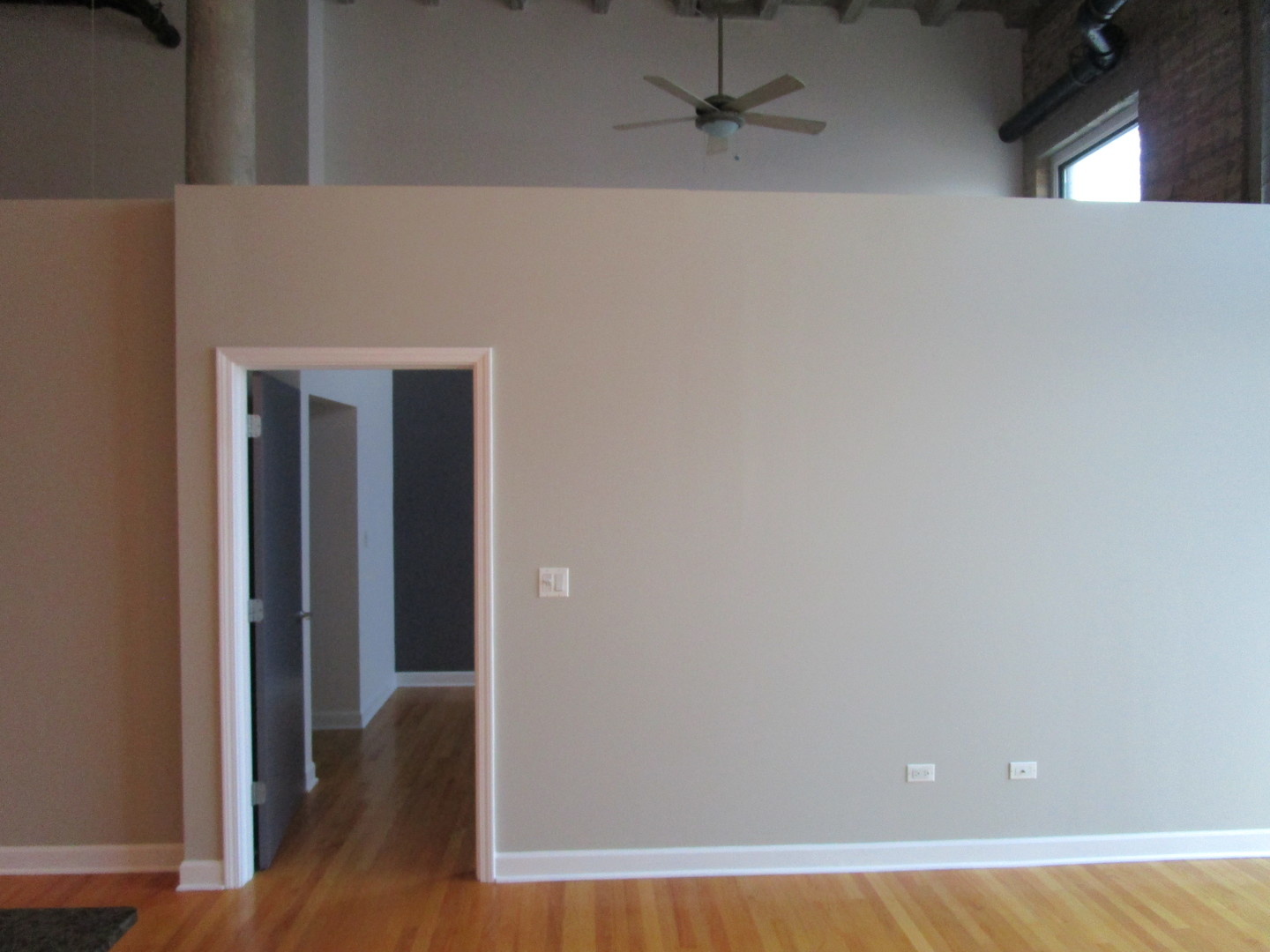 2545 South Dearborn Street, Unit 608 Chicago, IL 60616 - Photo 22 of 28 a view of a room with wooden floor